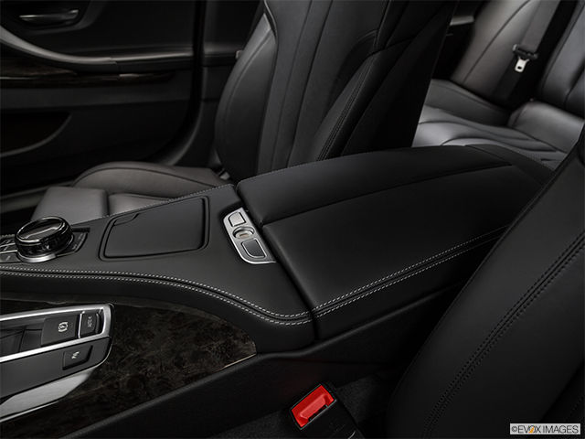 2018 BMW M6 Coupe | Front center console with closed lid, from driver’s side looking down