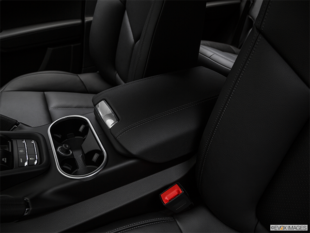 2018 Porsche Cayenne | Front center console with closed lid, from driver’s side looking down