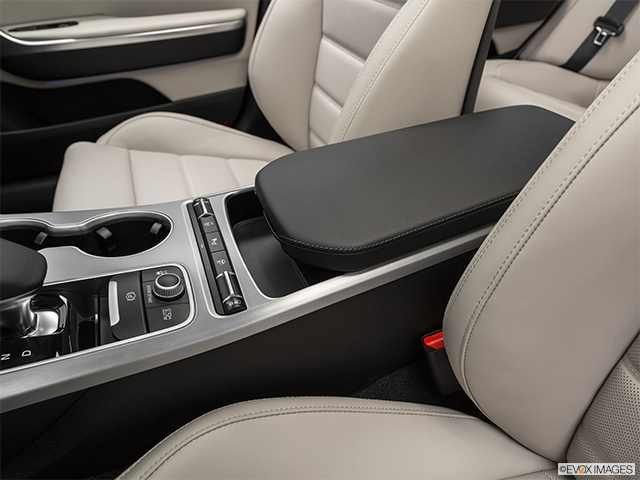 2019 Kia Stinger | Front center console with closed lid, from driver’s side looking down