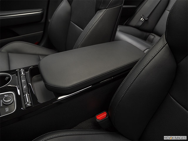 2019 Kia Stinger | Front center console with closed lid, from driver’s side looking down