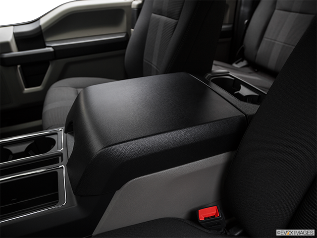 2019 Ford F-150 | Front center console with closed lid, from driver’s side looking down