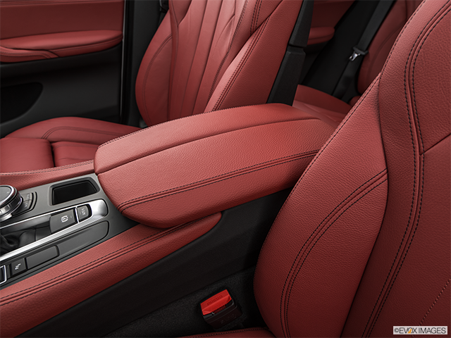 2019 BMW X6 M | Front center console with closed lid, from driver’s side looking down