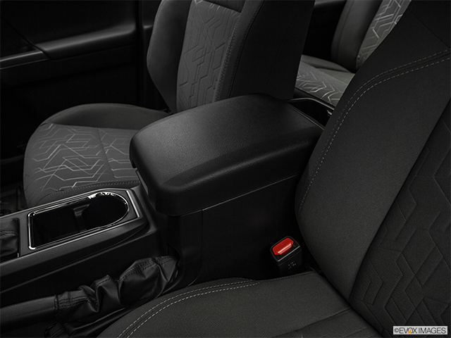 2019 Toyota Tacoma | Front center console with closed lid, from driver’s side looking down
