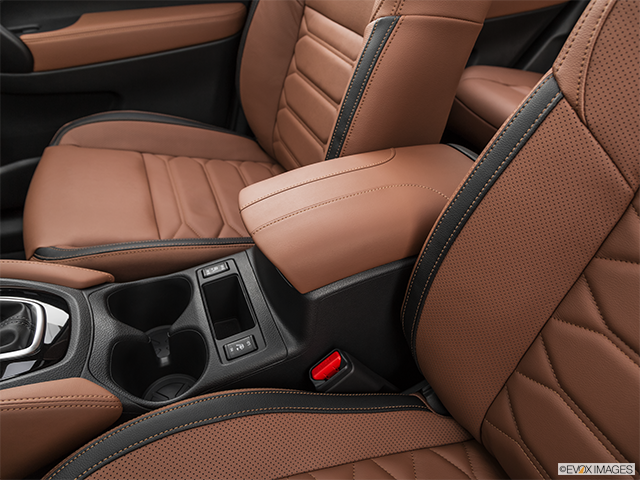 2019 Nissan Rogue | Front center console with closed lid, from driver’s side looking down