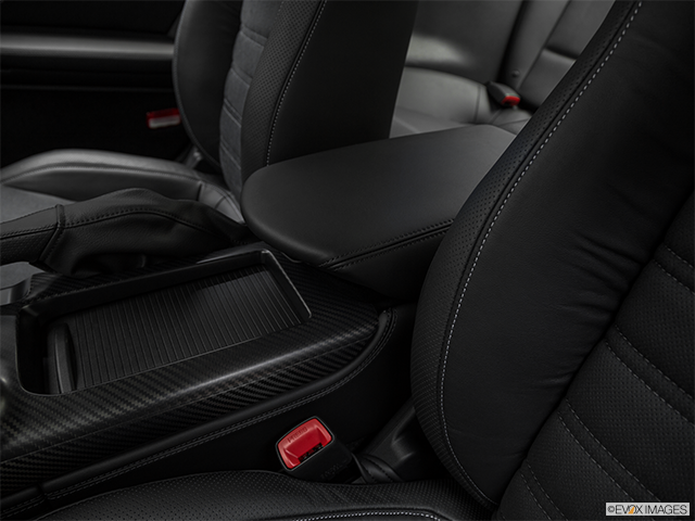 2019 Nissan GT-R | Front center console with closed lid, from driver’s side looking down