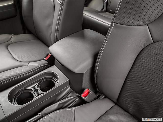 2015 Nissan Xterra | Front center console with closed lid, from driver’s side looking down