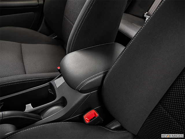 2015 Mitsubishi Lancer Evolution | Front center console with closed lid, from driver’s side looking down