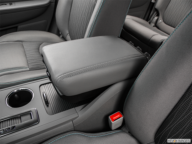 2015 Chevrolet Traverse | Front center console with closed lid, from driver’s side looking down