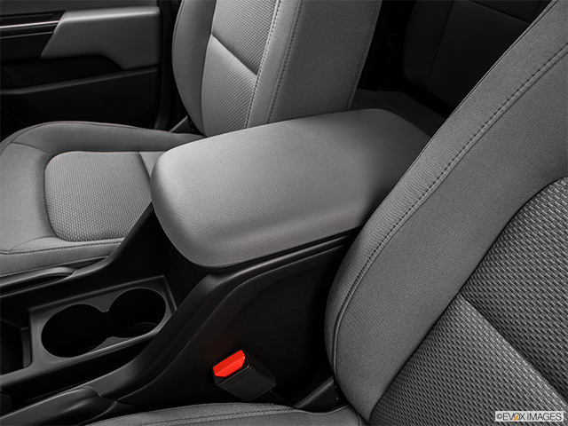 2015 GMC Canyon | Front center console with closed lid, from driver’s side looking down