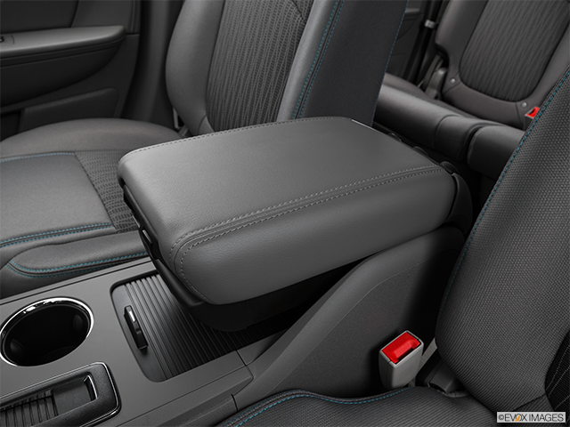 2016 Chevrolet Traverse | Front center console with closed lid, from driver’s side looking down