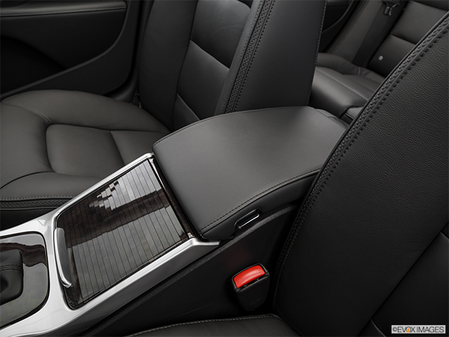 2016 Volvo XC70 | Front center console with closed lid, from driver’s side looking down
