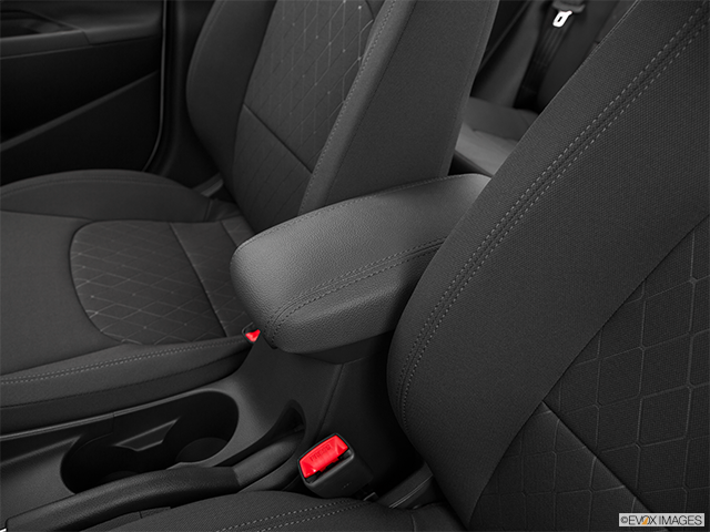2016 Kia Rio | Front center console with closed lid, from driver’s side looking down