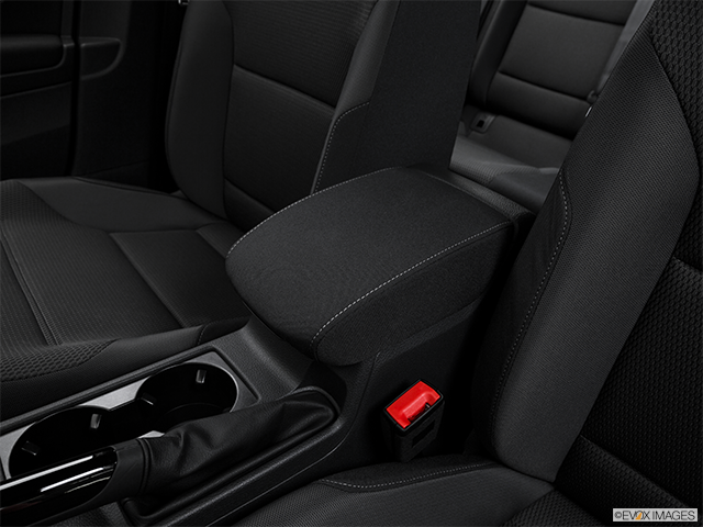 2016 Volkswagen Golf Sportwagon | Front center console with closed lid, from driver’s side looking down