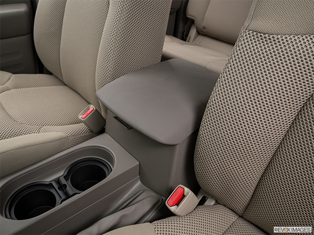 2016 Nissan Frontier | Front center console with closed lid, from driver’s side looking down
