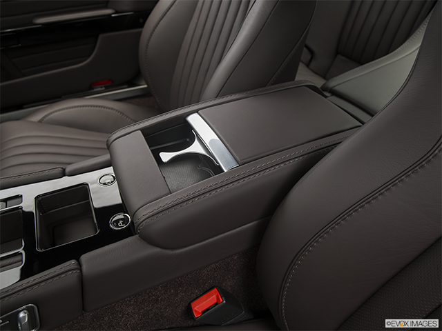 2016 Aston Martin DB9 | Front center console with closed lid, from driver’s side looking down