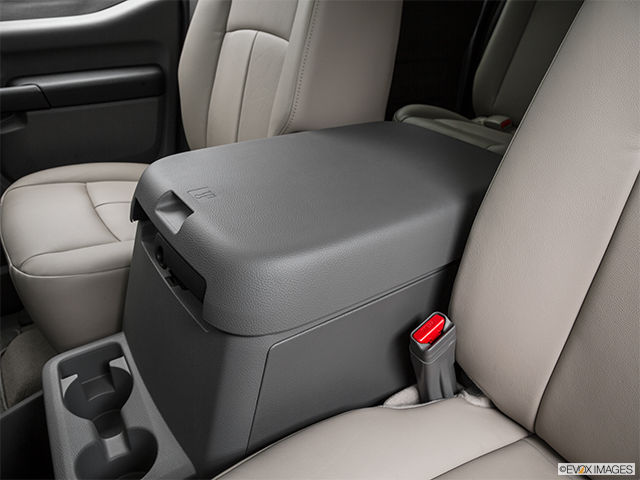 2016 Nissan NV Passenger | Front center console with closed lid, from driver’s side looking down