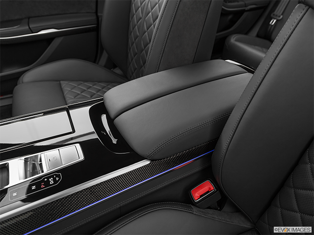 2022 Audi S8 | Front center console with closed lid, from driver’s side looking down