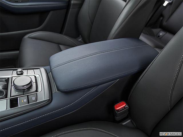 2023 Mazda CX-30 | Front center console with closed lid, from driver’s side looking down
