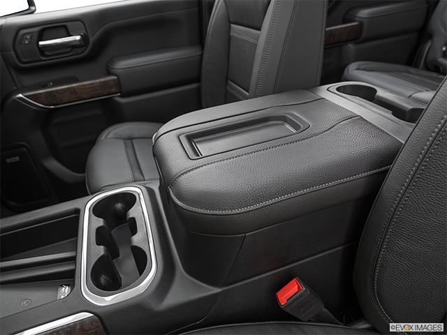 2024 GMC Sierra 3500HD | Front center console with closed lid, from driver’s side looking down