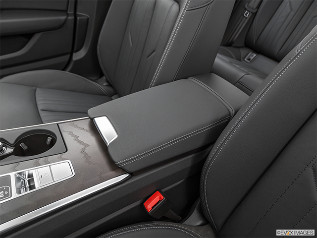 2024 Audi A6 | Front center console with closed lid, from driver’s side looking down