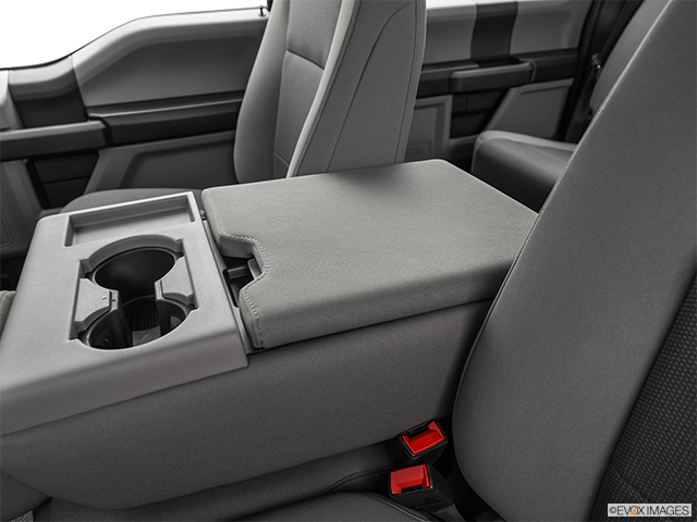 2022 Ford F-350 Super Duty | Front center console with closed lid, from driver’s side looking down