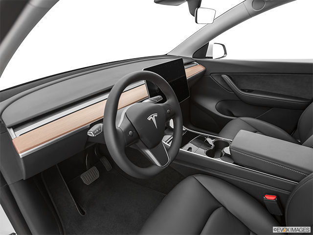 2024 Tesla Model Y | Interior Hero (driver’s side)