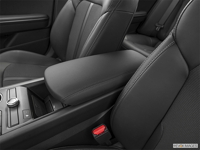 2024 Kia K5 | Front center console with closed lid, from driver’s side looking down