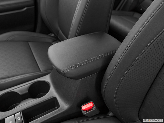 2022 Kia Seltos | Front center console with closed lid, from driver’s side looking down