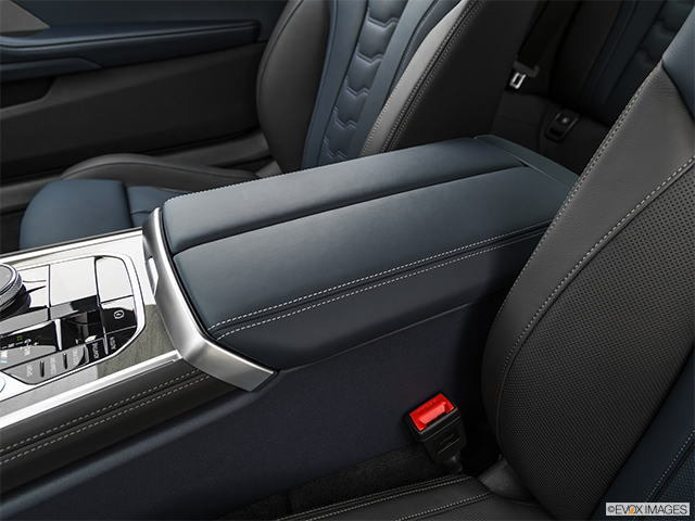 2022 BMW M8 Coupe | Front center console with closed lid, from driver’s side looking down