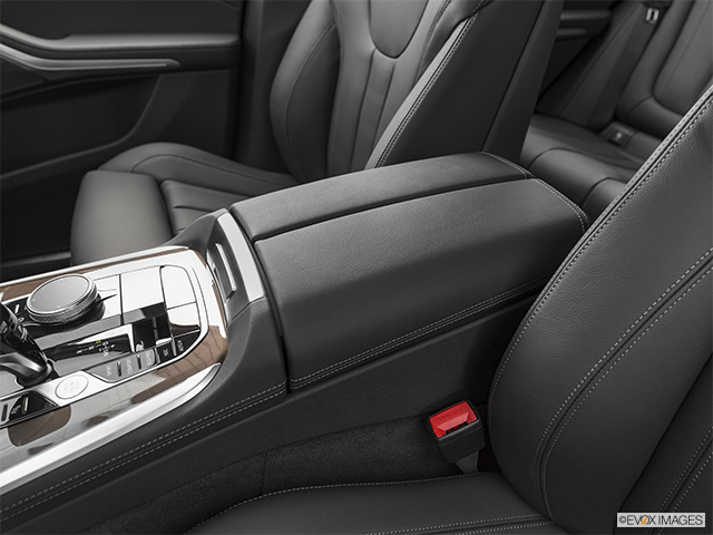 2022 BMW X5 | Front center console with closed lid, from driver’s side looking down