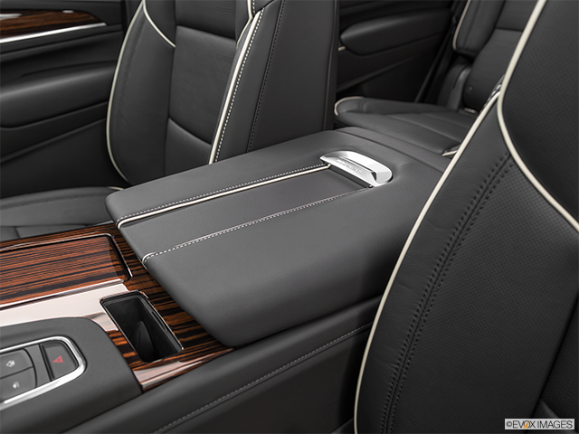 2022 Cadillac Escalade | Front center console with closed lid, from driver’s side looking down