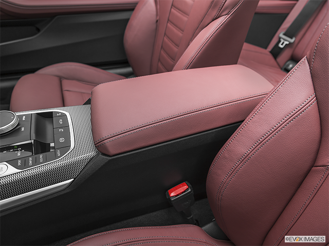 2022 BMW 4 Series | Front center console with closed lid, from driver’s side looking down