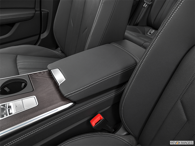 2024 Audi A7 | Front center console with closed lid, from driver’s side looking down