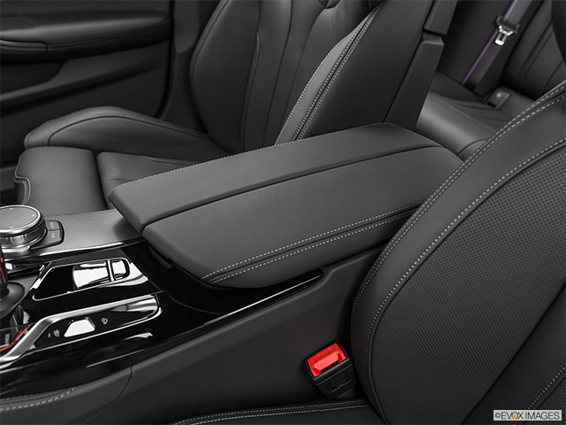 2022 BMW M5 Sedan | Front center console with closed lid, from driver’s side looking down