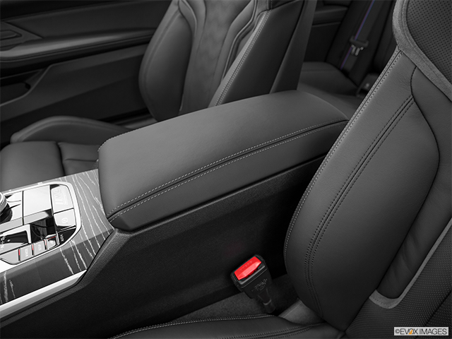 2024 BMW 4 Series | Front center console with closed lid, from driver’s side looking down