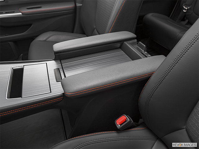 2023 Toyota Sienna | Front center console with closed lid, from driver’s side looking down