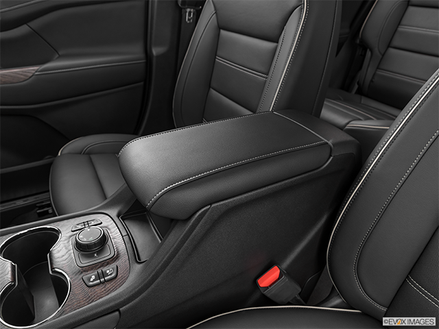 2024 GMC Acadia | Front center console with closed lid, from driver’s side looking down