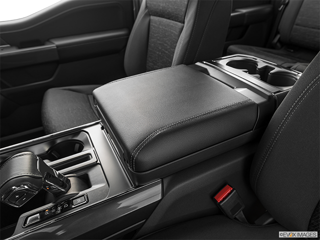 2023 Ford F-150 | Front center console with closed lid, from driver’s side looking down