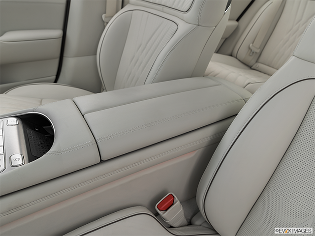 2023 Genesis G90 | Front center console with closed lid, from driver’s side looking down