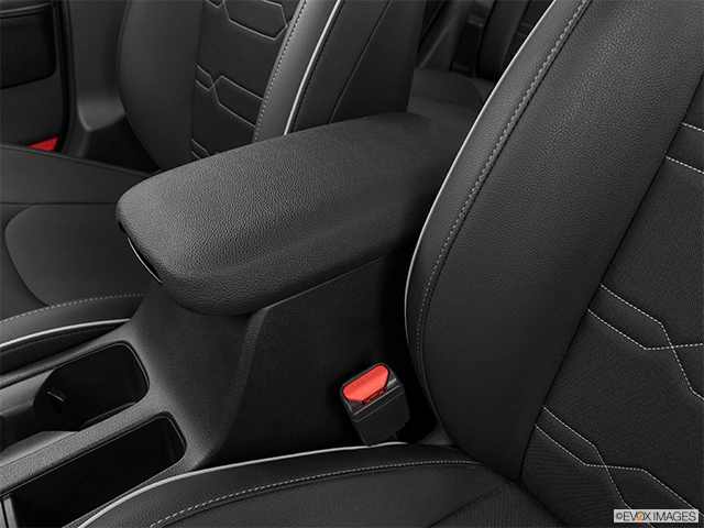 2024 Kia Forte | Front center console with closed lid, from driver’s side looking down