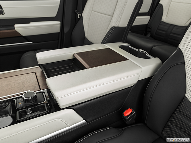 2023 Toyota Tundra Hybrid | Front center console with closed lid, from driver’s side looking down