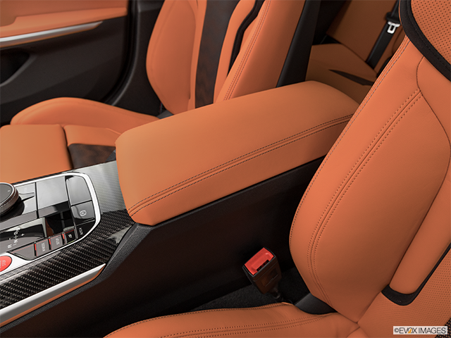 2023 BMW M3 Sedan | Front center console with closed lid, from driver’s side looking down