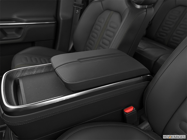 2024 Rivian R1T | Front center console with closed lid, from driver’s side looking down