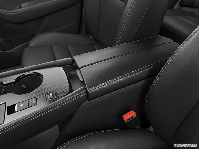 2024 Nissan Rogue | Front center console with closed lid, from driver’s side looking down