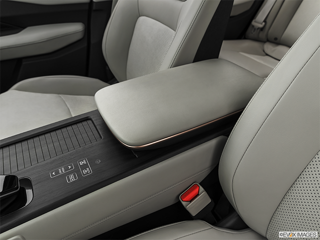2024 Nissan Ariya | Front center console with closed lid, from driver’s side looking down