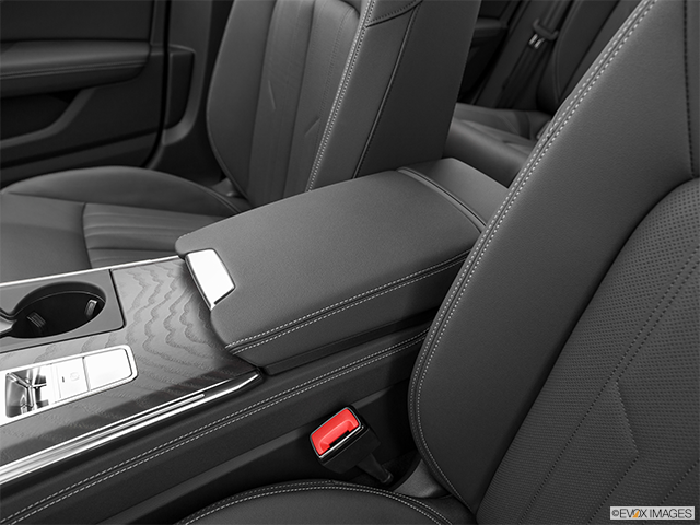 2023 Audi A6 | Front center console with closed lid, from driver’s side looking down