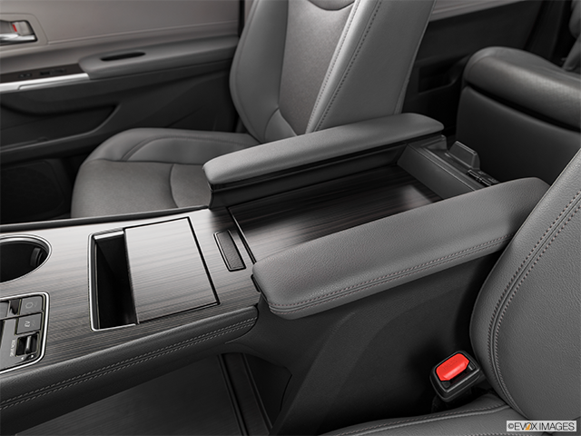 2024 Toyota Sienna | Front center console with closed lid, from driver’s side looking down