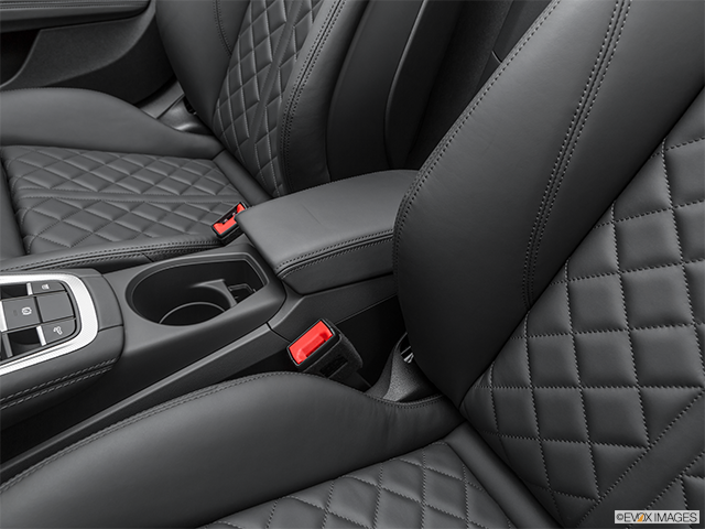 2023 Audi TT | Front center console with closed lid, from driver’s side looking down