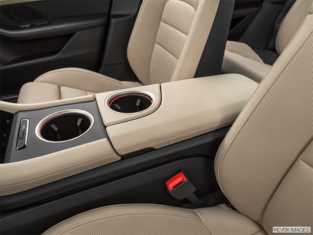 2023 Porsche Taycan | Front center console with closed lid, from driver’s side looking down