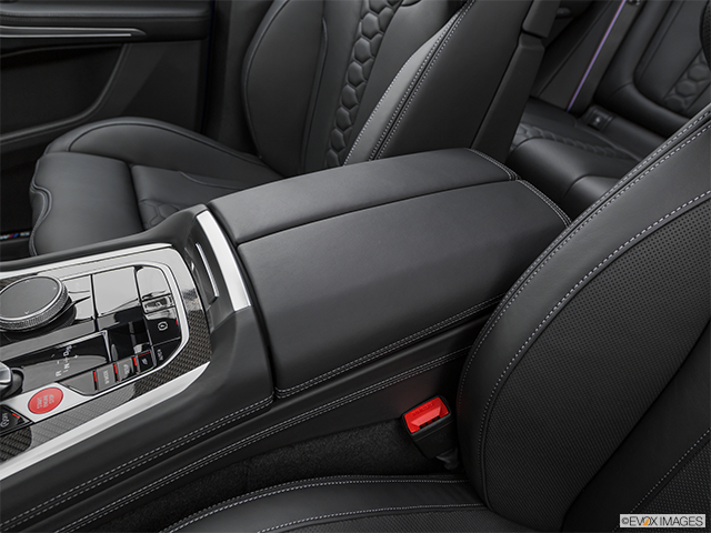 2022 BMW X5 M | Front center console with closed lid, from driver’s side looking down
